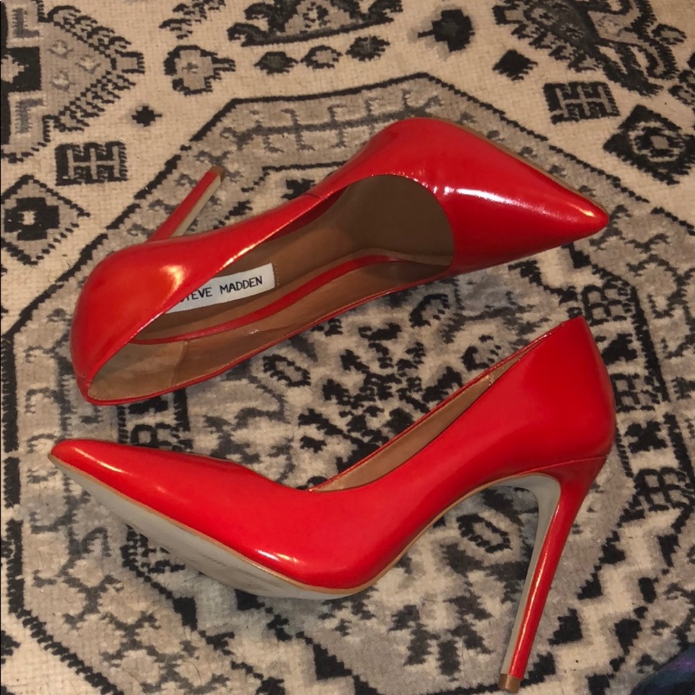 Red patent leather pumps